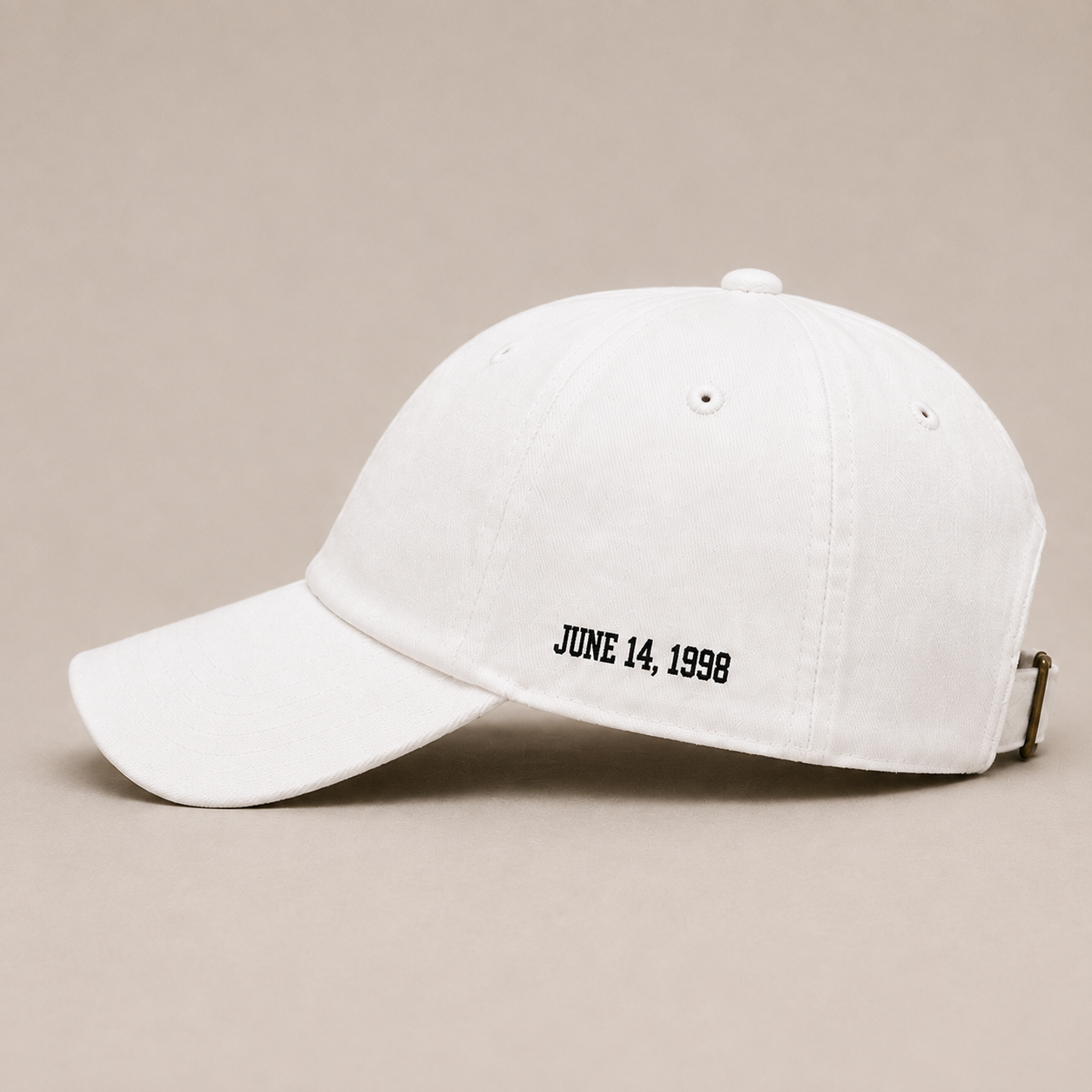 Side view of The Last Shot embroidered dad cap in white by Hai Tide highlighting the side embroidery, curved brim, adjustable fit, and premium cotton construction.