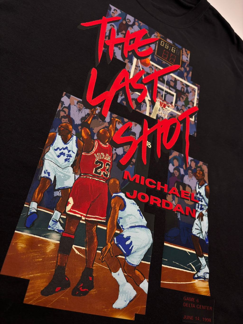 Close-up of the original front graphic artwork printed on The Last Shot Tee in Black by Hai Tide. The Last Shot Tee features original fan artwork inspired by Michael Jordan's iconic "Last Shot" moment.