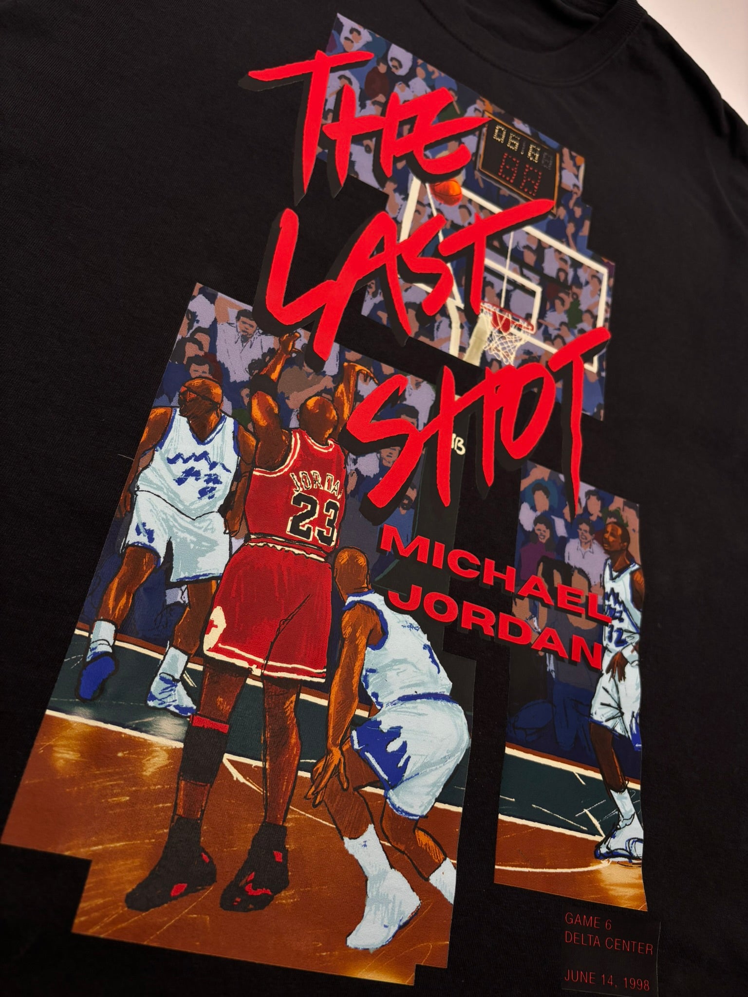 Close-up of the original front graphic artwork printed on The Last Shot Tee in Black by Hai Tide. The Last Shot Tee features original fan artwork inspired by Michael Jordan's iconic "Last Shot" moment.